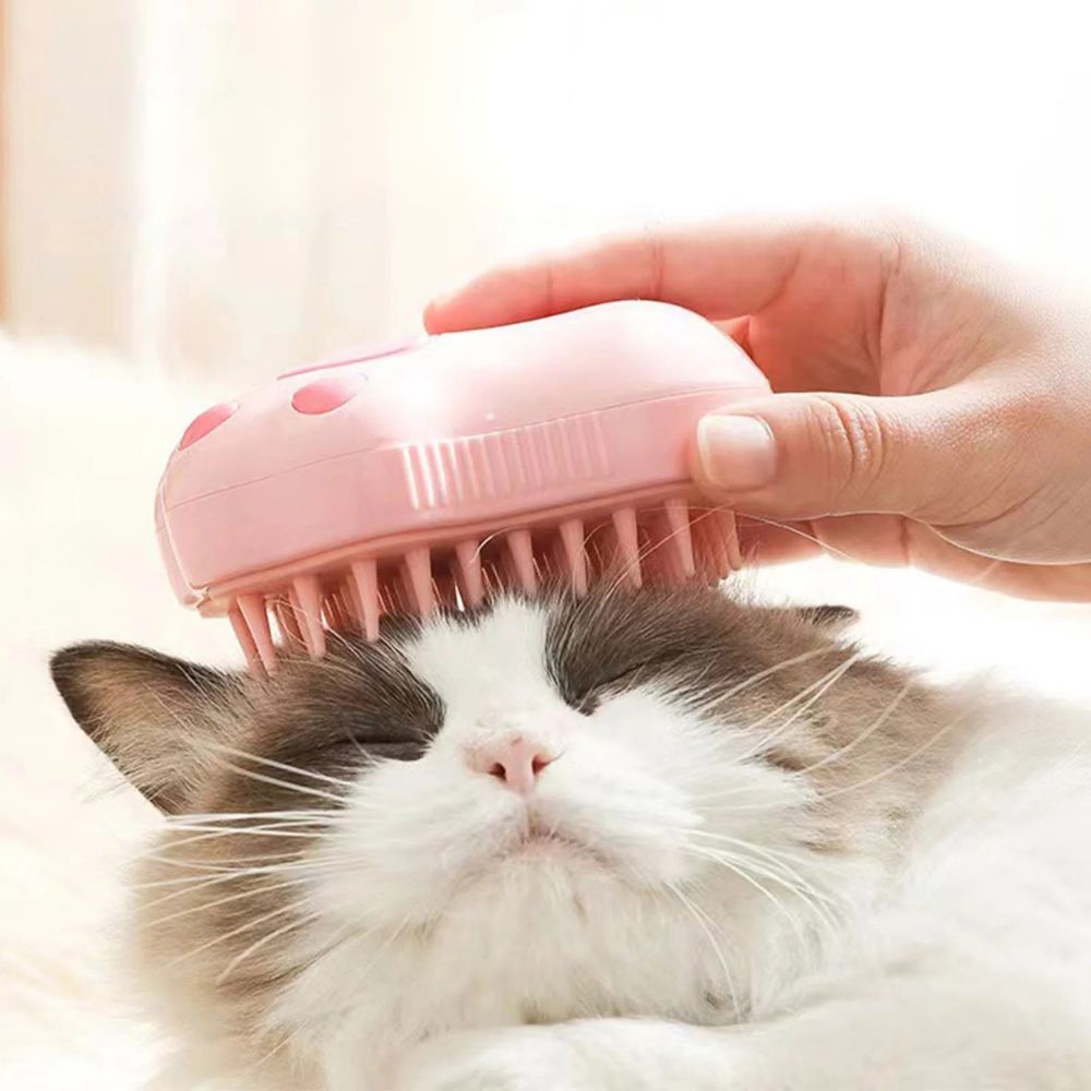 Cat being groomed with the BarkNest 3-in-1 Grooming Steam Brush